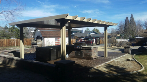 Freestanding aluminum patio cover over outdoor BBQ area